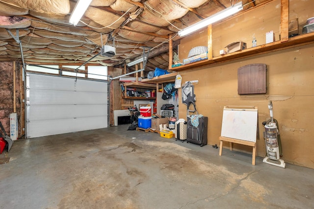 4 Johns Dr Unit A, Hooksett, NH 03106 - garage featuring a garage door opener