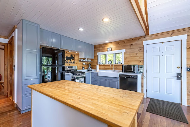 72 Auclair Rd, Middleton, NH 03887 - kitchen featuring black appliances, wooden counters, a sink, dark wood finished floors, and wood ceiling