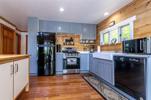 72 Auclair Rd, Middleton, NH 03887 - kitchen featuring black appliances, a sink, dark wood-style flooring, butcher block counters, and recessed lighting