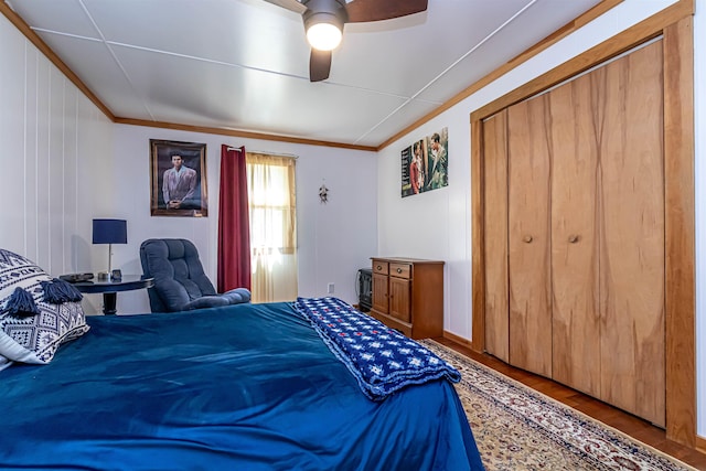 72 Auclair Rd, Middleton, NH 03887 - bedroom with ornamental molding, wood finished floors, and a ceiling fan