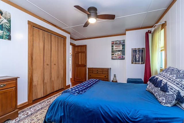 72 Auclair Rd, Middleton, NH 03887 - bedroom with wood finished floors, ceiling fan, a closet, and crown molding