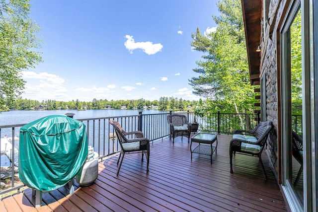 72 Auclair Rd, Middleton, NH 03887 - wooden deck with a water view and grilling area