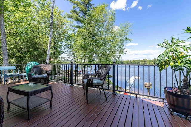 72 Auclair Rd, Middleton, NH 03887 - wooden deck featuring a water view