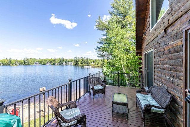 72 Auclair Rd, Middleton, NH 03887 - wooden deck with a water view