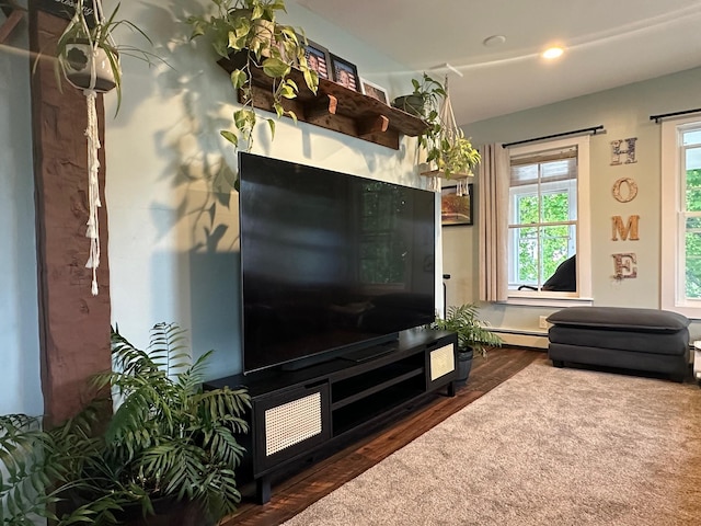 8 Main St, Bennington, NH 03442 - living room featuring wood finished floors, recessed lighting, and a baseboard heating unit