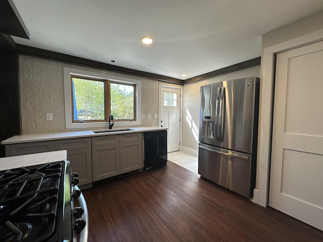 8 Main St, Bennington, NH 03442 - kitchen featuring stainless steel refrigerator with ice dispenser, black dishwasher, a sink, gas range, and light countertops