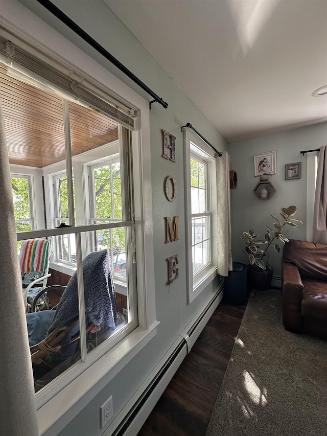 8 Main St, Bennington, NH 03442 - interior space with dark wood-type flooring and a baseboard radiator
