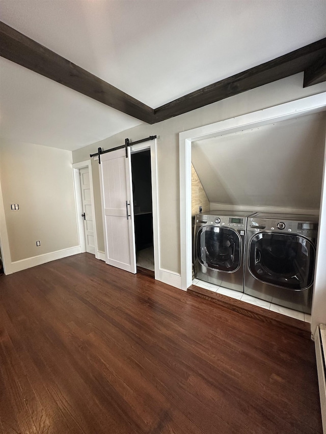 8 Main St, Bennington, NH 03442 - washroom featuring separate washer and dryer, a barn door, dark wood-style floors, baseboards, and a baseboard heating unit