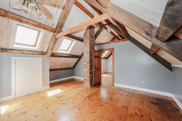 278 N Rd, Deerfield, NH 03037 - bonus room featuring hardwood / wood-style flooring, a skylight, and baseboards