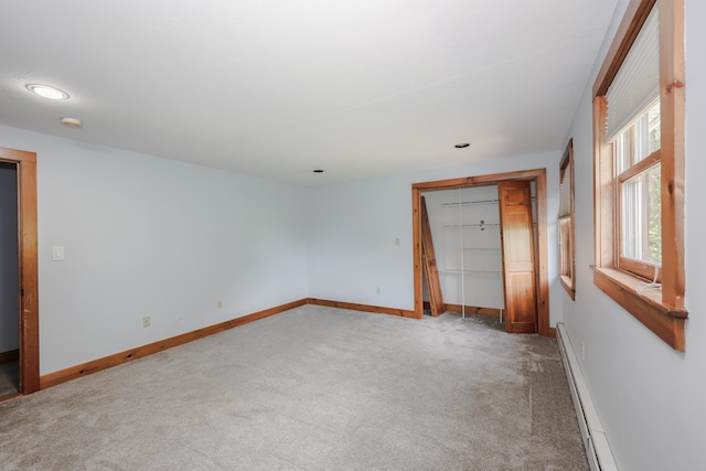 278 N Rd, Deerfield, NH 03037 - empty room featuring carpet flooring, baseboards, a baseboard radiator, and a smoke detector