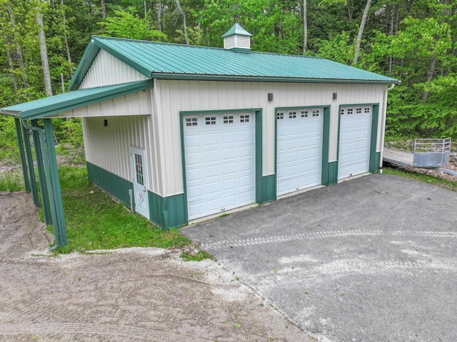 278 N Rd, Deerfield, NH 03037 - detached garage with a forest view