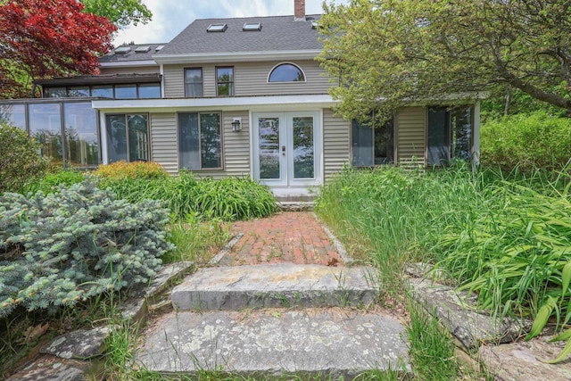278 N Rd, Deerfield, NH 03037 - doorway to property featuring french doors, a chimney, and a shingled roof