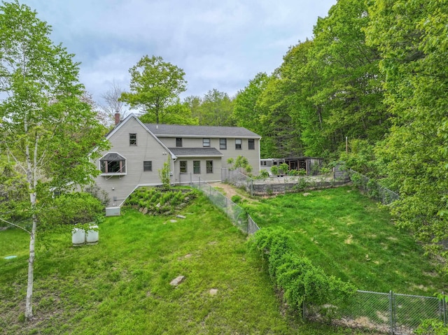 278 N Rd, Deerfield, NH 03037 - back of property with a chimney and roof with shingles
