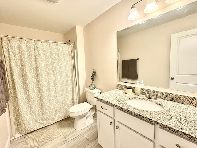 17 Callaway Dr Unit 4, Concord, NH 03301 - bathroom featuring vanity and toilet
