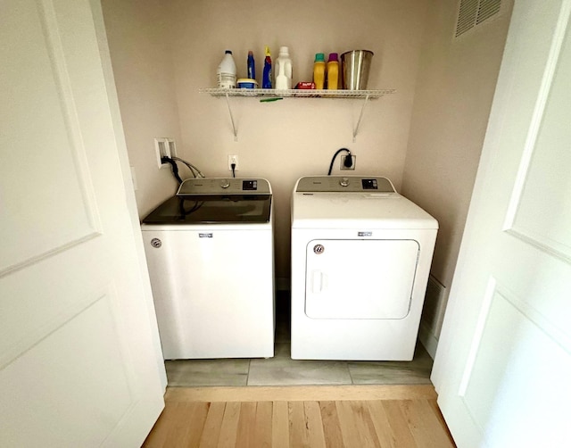 17 Callaway Dr Unit 4, Concord, NH 03301 - laundry area with separate washer and dryer and light wood finished floors