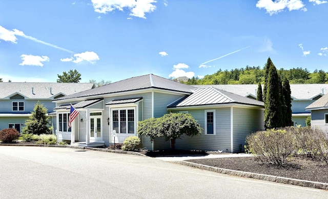 17 Callaway Dr Unit 4, Concord, NH 03301 - single story home with french doors, metal roof, and a standing seam roof