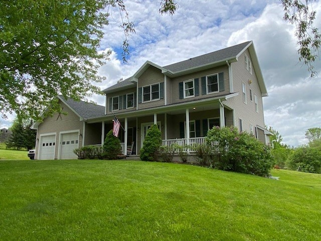 647 Poker Hill Rd, Underhill, VT 05489 - view of front facade featuring covered porch, a front yard, and a garage