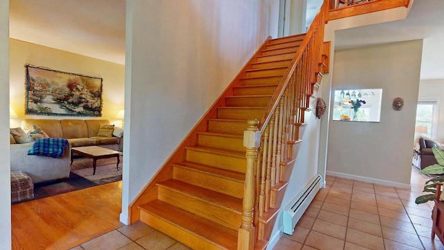 647 Poker Hill Rd, Underhill, VT 05489 - stairway featuring baseboard heating, tile patterned floors, and baseboards
