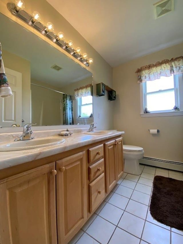 647 Poker Hill Rd, Underhill, VT 05489 - full bath featuring a baseboard radiator, tile patterned flooring, double vanity, toilet, and a shower with curtain
