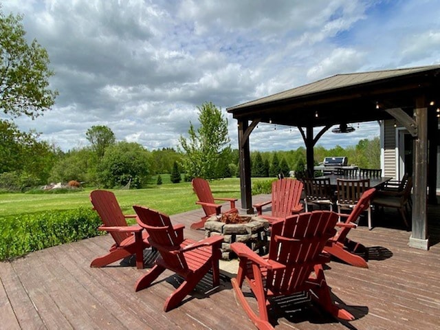 647 Poker Hill Rd, Underhill, VT 05489 - wooden deck featuring an outdoor fire pit and a yard