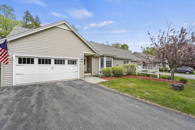 27 Autumn Ln, Hampstead, NH 03826 - ranch-style house featuring an attached garage, asphalt driveway, a front yard, and a shingled roof