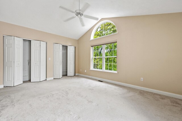 27 Autumn Ln, Hampstead, NH 03826 - unfurnished bedroom with multiple closets, carpet, vaulted ceiling, and baseboards