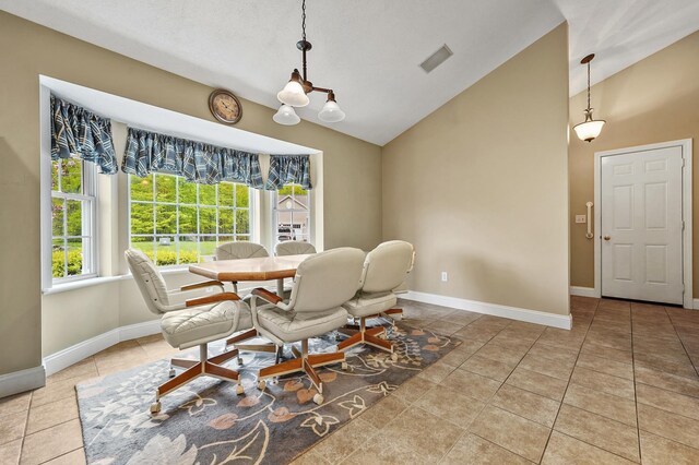 27 Autumn Ln, Hampstead, NH 03826 - dining area featuring baseboards, tile patterned flooring, a chandelier, and high vaulted ceiling