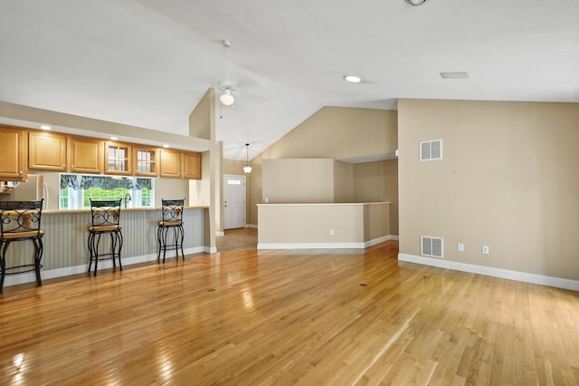 27 Autumn Ln, Hampstead, NH 03826 - living area featuring vaulted ceiling, a ceiling fan, light wood-style flooring, and baseboards