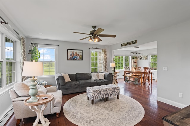 6 Pheasant Run Rd, Fairfax, VT 05454 - living area with a baseboard heating unit, healthy amount of natural light, dark wood-style floors, and a ceiling fan
