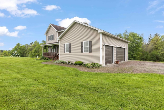 6 Pheasant Run Rd, Fairfax, VT 05454 - view of side of home featuring a yard and a garage