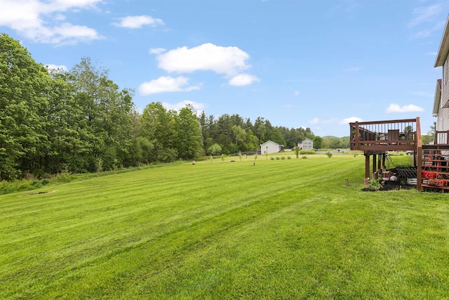 6 Pheasant Run Rd, Fairfax, VT 05454 - view of grassy yard with a wooden deck