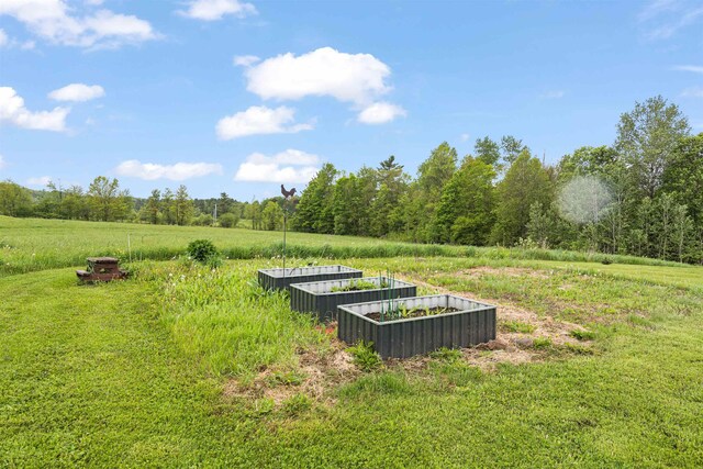 6 Pheasant Run Rd, Fairfax, VT 05454 - view of green lawn featuring a garden and a rural view