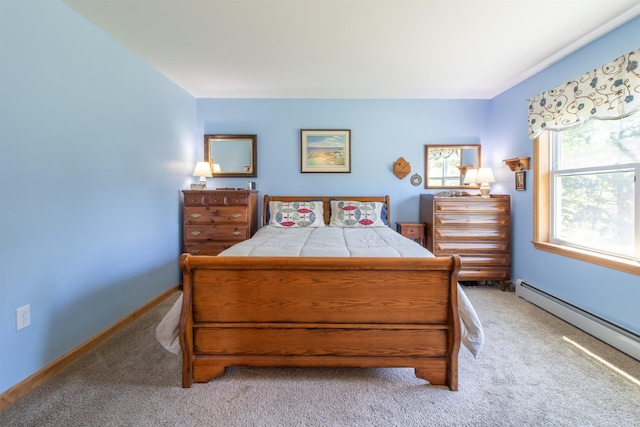 76 Back Of The Moon Rd, Kirby, VT 05832 - bedroom featuring a baseboard heating unit, carpet floors, and baseboards