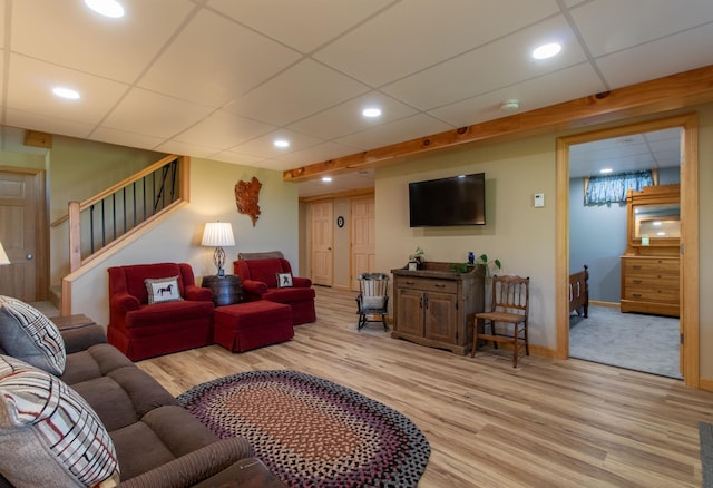 76 Back Of The Moon Rd, Kirby, VT 05832 - living room with light wood-style floors, a paneled ceiling, stairs, recessed lighting, and baseboards