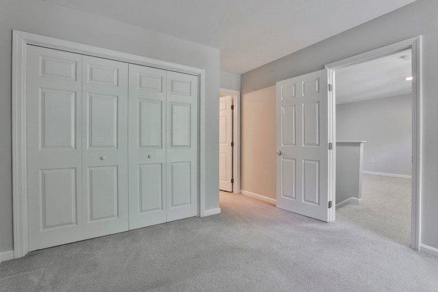 1465 Hooksett Rd Unit 403, Hooksett, NH 03106 - unfurnished bedroom featuring carpet flooring, baseboards, and a closet