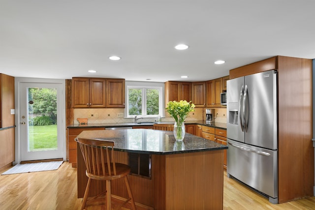 245-247 Danville Rd, Fremont, NH 03044 - kitchen featuring appliances with stainless steel finishes, a sink, plenty of natural light, light wood-style flooring, and recessed lighting