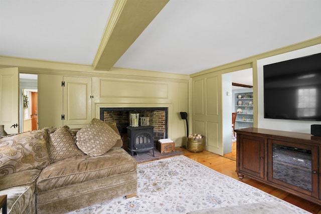 245-247 Danville Rd, Fremont, NH 03044 - living room featuring a wood stove and light wood-type flooring