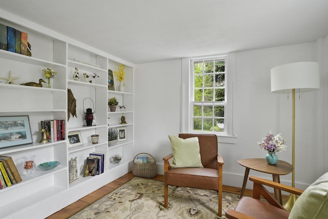 245-247 Danville Rd, Fremont, NH 03044 - sitting room with wood finished floors and baseboards