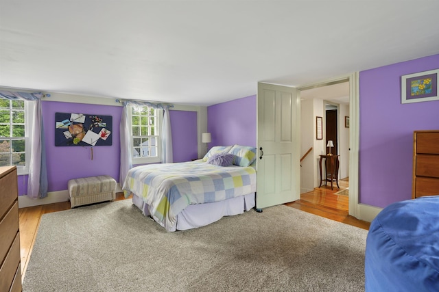 245-247 Danville Rd, Fremont, NH 03044 - bedroom featuring multiple windows and wood finished floors