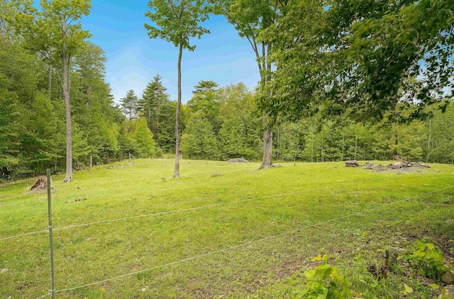 245-247 Danville Rd, Fremont, NH 03044 - view of grassy yard featuring a wooded view