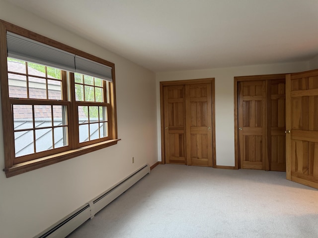 52 Jericho Rd, Grantham, NH 03753 - unfurnished bedroom with a baseboard radiator, light carpet, and baseboards
