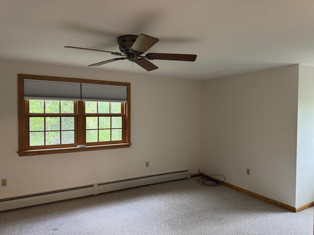 52 Jericho Rd, Grantham, NH 03753 - carpeted spare room featuring ceiling fan, a baseboard heating unit, and baseboards