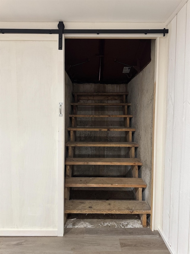 52 Jericho Rd, Grantham, NH 03753 - stairway with wood finished floors and a barn door