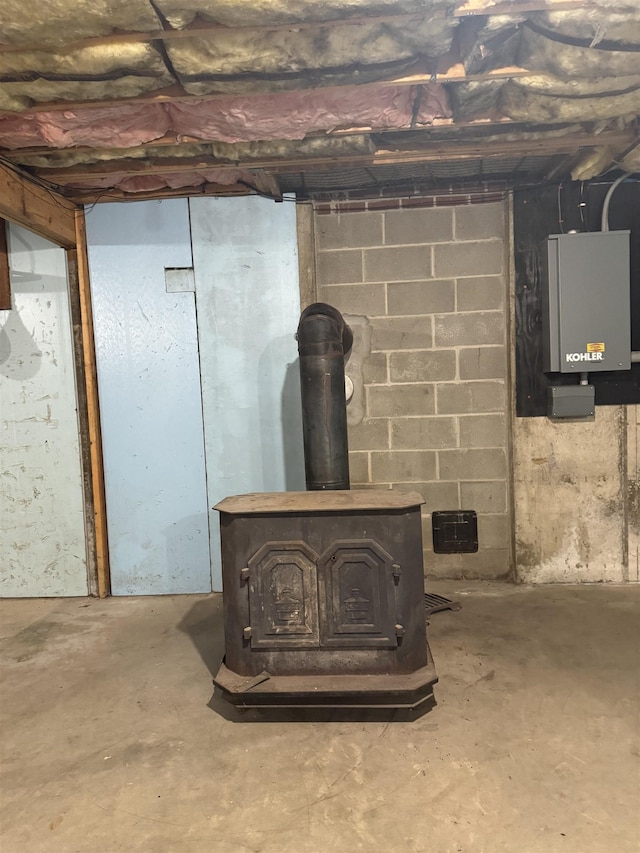 52 Jericho Rd, Grantham, NH 03753 - basement view of concrete floors and a wood stove