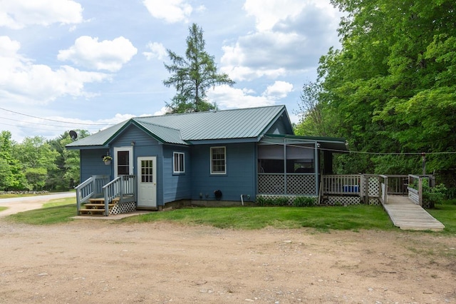 101 Mudgett Hill Rd, Loudon, NH 03307 - back of property with driveway and metal roof
