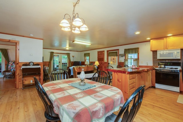 101 Mudgett Hill Rd, Loudon, NH 03307 - dining space featuring a chandelier, light wood-type flooring, ornamental molding, recessed lighting, and french doors
