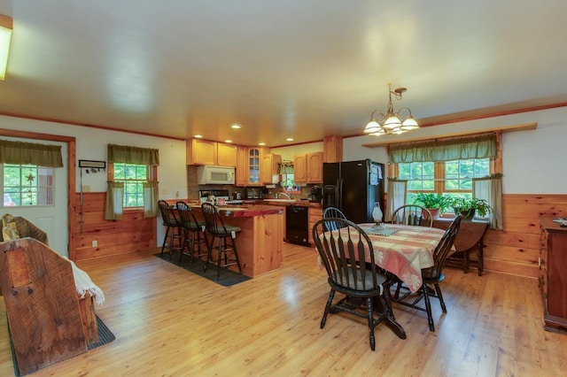 101 Mudgett Hill Rd, Loudon, NH 03307 - dining area featuring light wood-style floors, a wainscoted wall, a chandelier, and recessed lighting