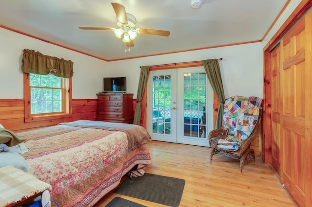 101 Mudgett Hill Rd, Loudon, NH 03307 - bedroom with french doors, access to outside, wood finished floors, a wainscoted wall, and ceiling fan