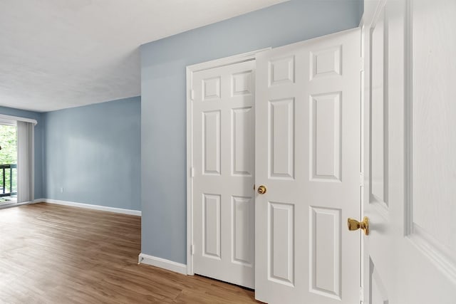 310 Brook Village Rd Unit 26, Nashua, NH 03062 - spare room with baseboards and wood finished floors