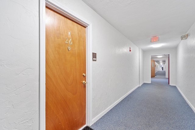 310 Brook Village Rd Unit 26, Nashua, NH 03062 - hall with carpet, baseboards, and a textured wall